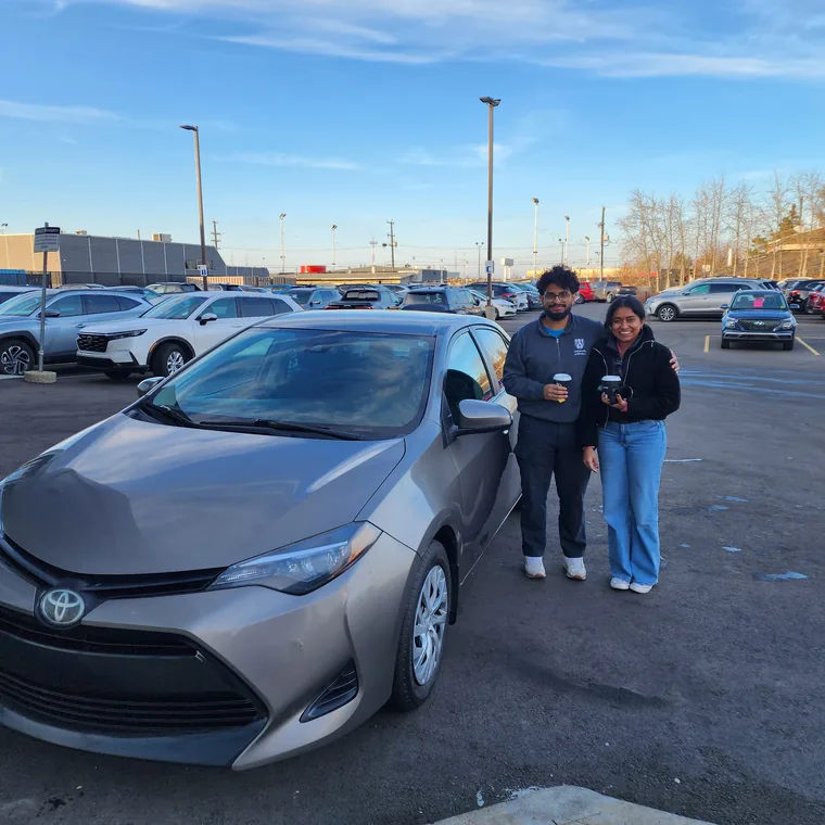 Happy couple with new Toyota